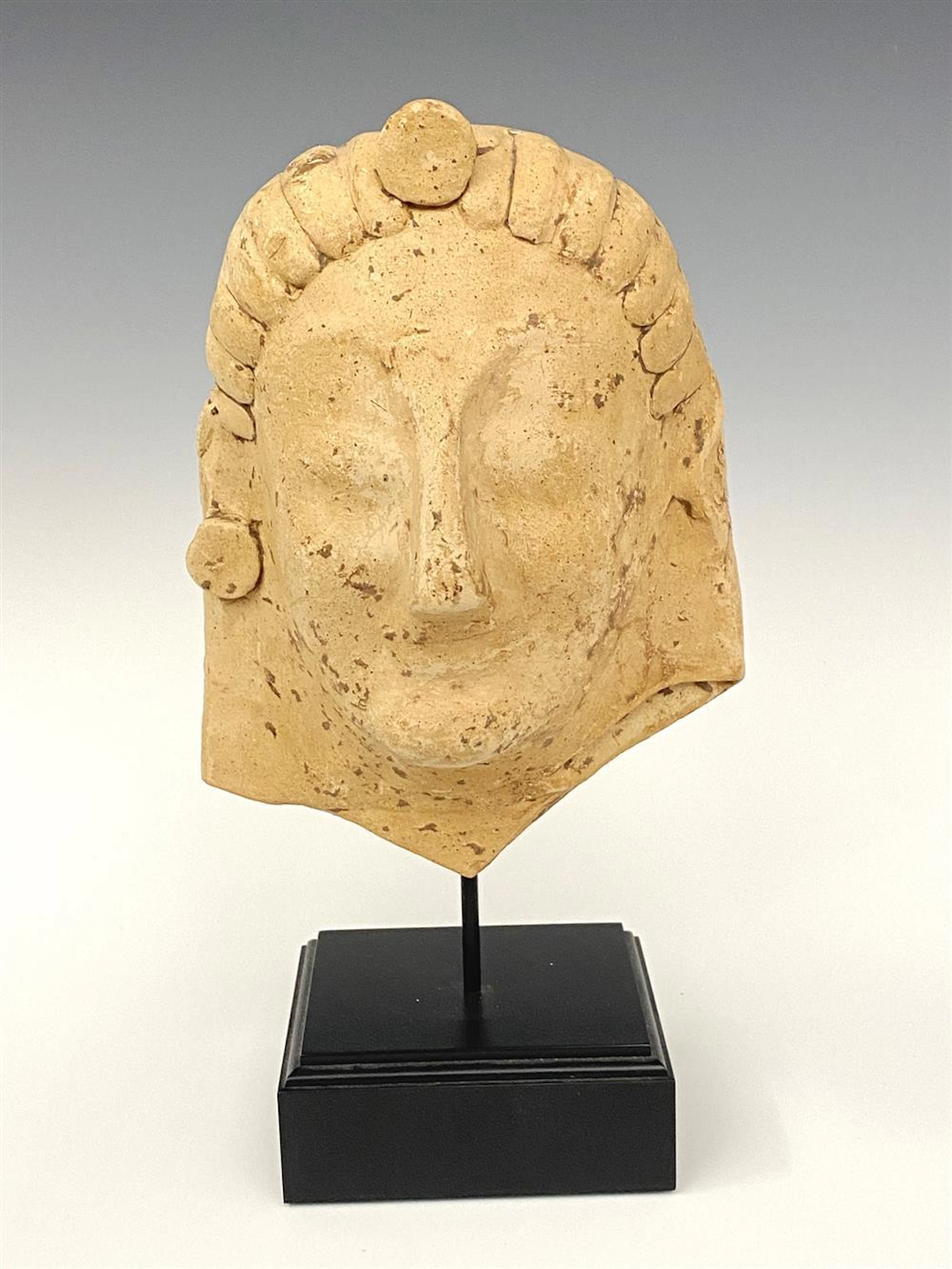 GREEK LATE ARCHAIC HEAD OF PERSEPHONE, Circa 520 BC.