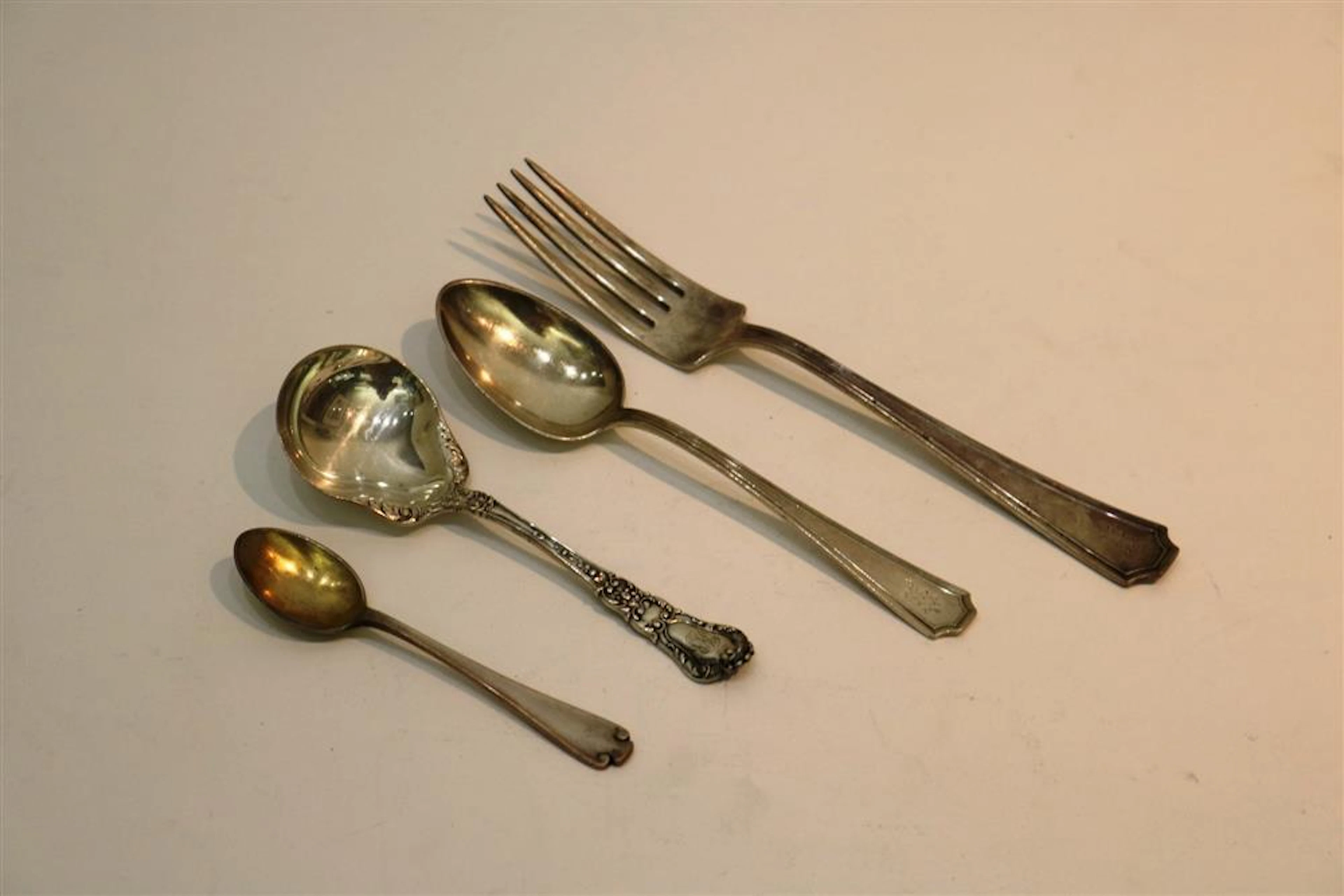 26 ASSORTED PIECES STERLING SILVER FLATWARE IN SMALL SETS. - Wt. 19.4 troy oz.