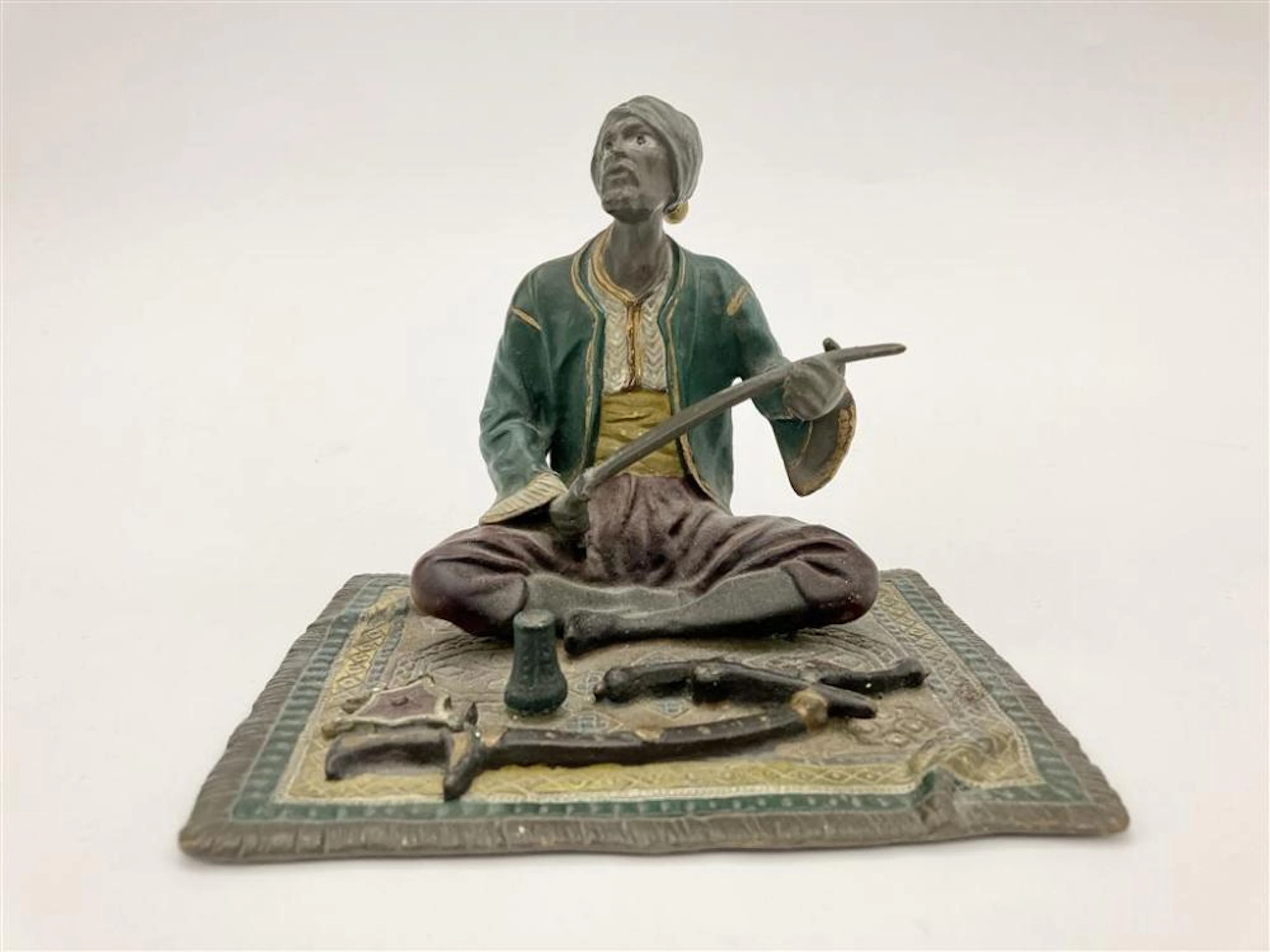 MINIATURE PAINTED COLD-CAST BRONZE FIGURE OF ARAB MAN...