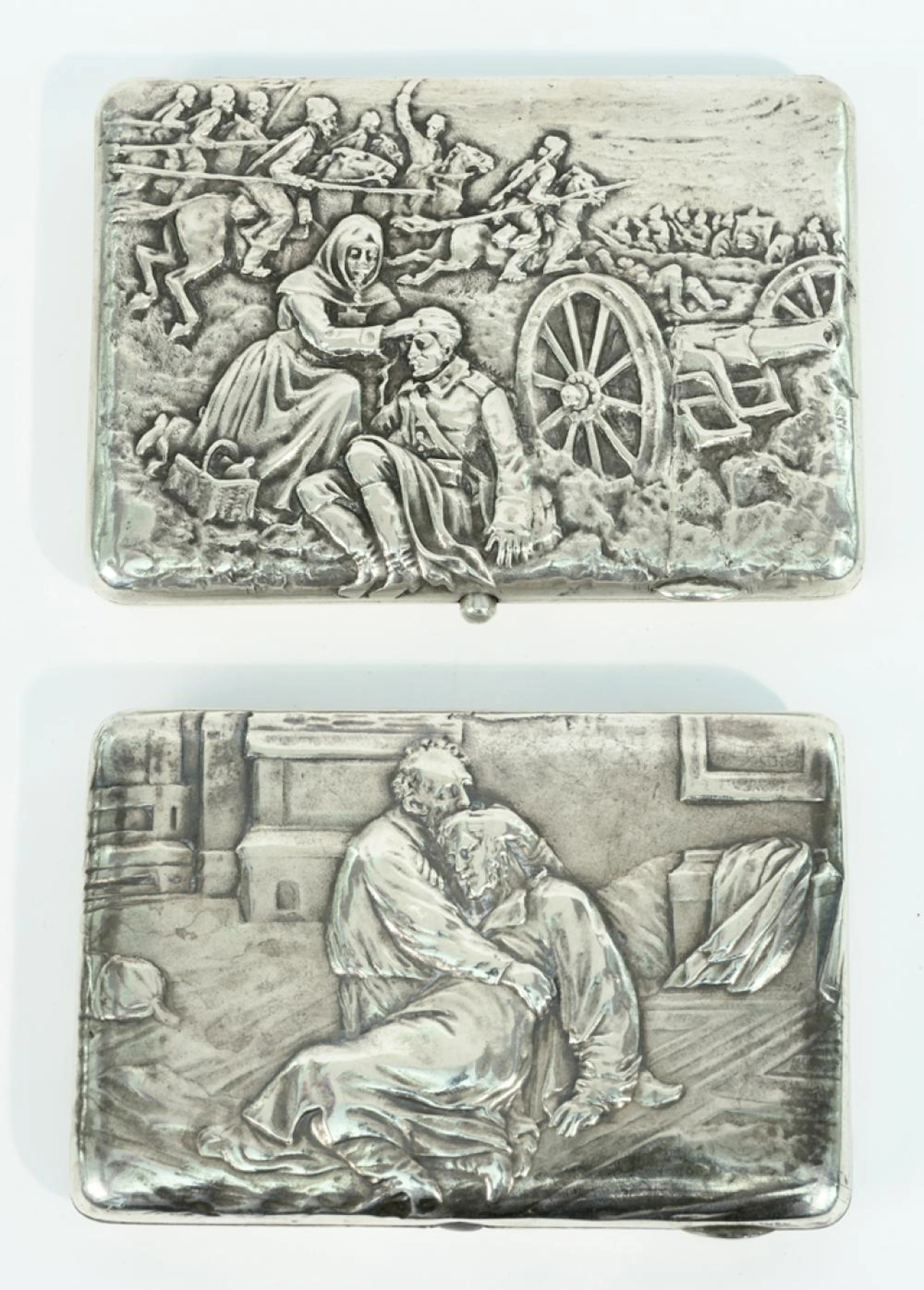 TWO RUSSIAN SILVER (84-FINE) RELIEF-DECORATED CIGARETTE CASES,