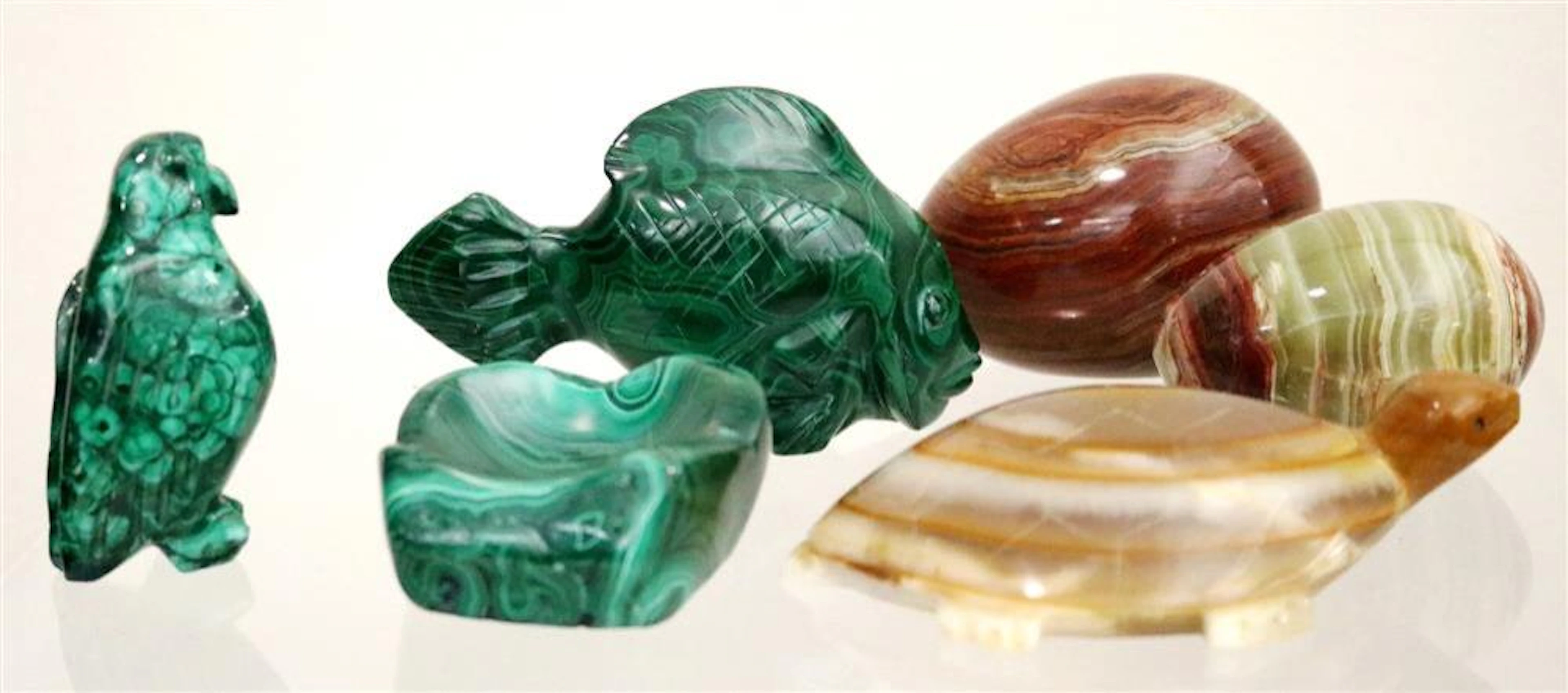 SIX CARVED STONE TABLE ANIMALS