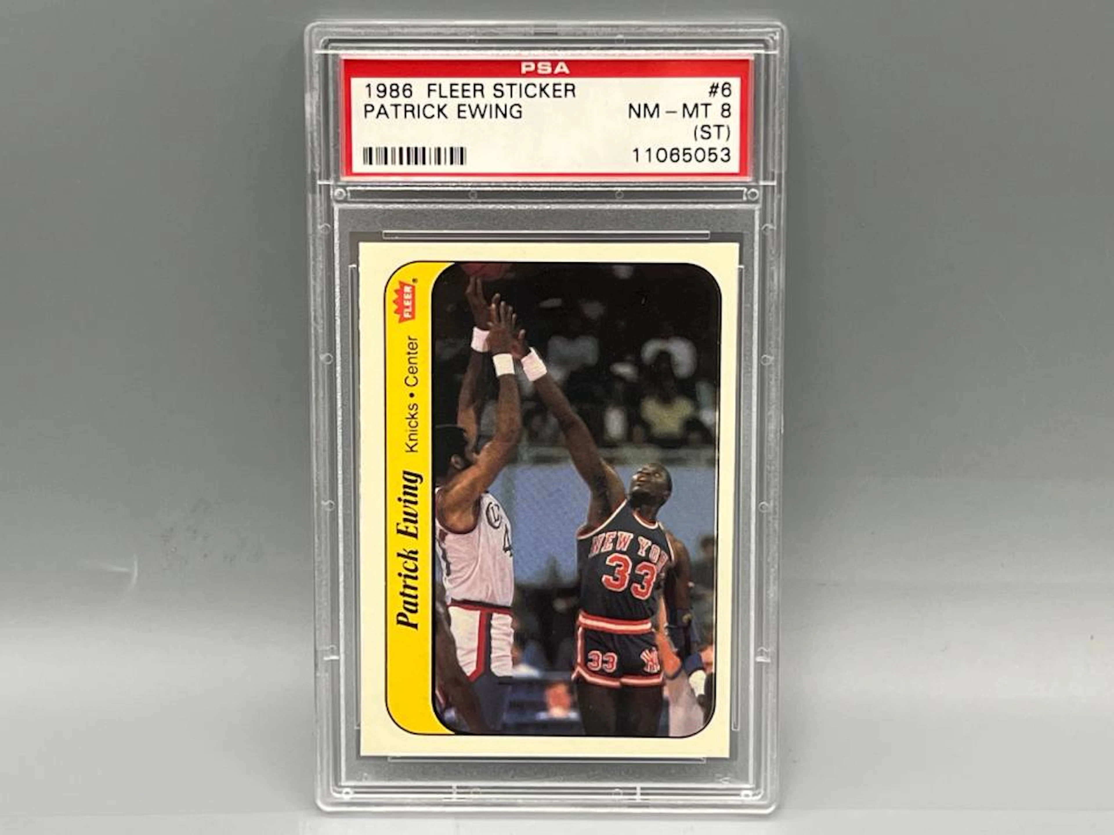 1986-87 Fleer Patrick Ewing RC Sticker #6 PSA 8 (ST)