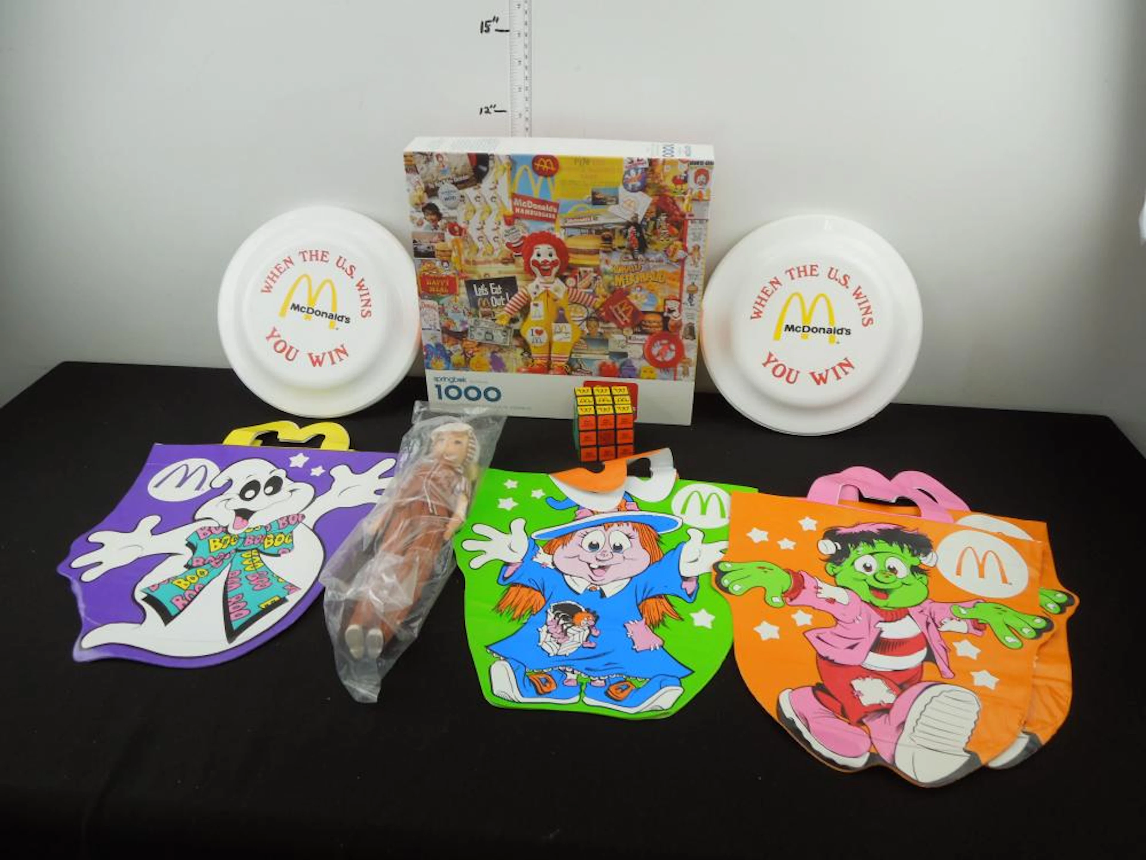 Mc Donald's Items. Puzzle, 2 Frisbees, Rubik's cube , Doll, and Halloween Bags