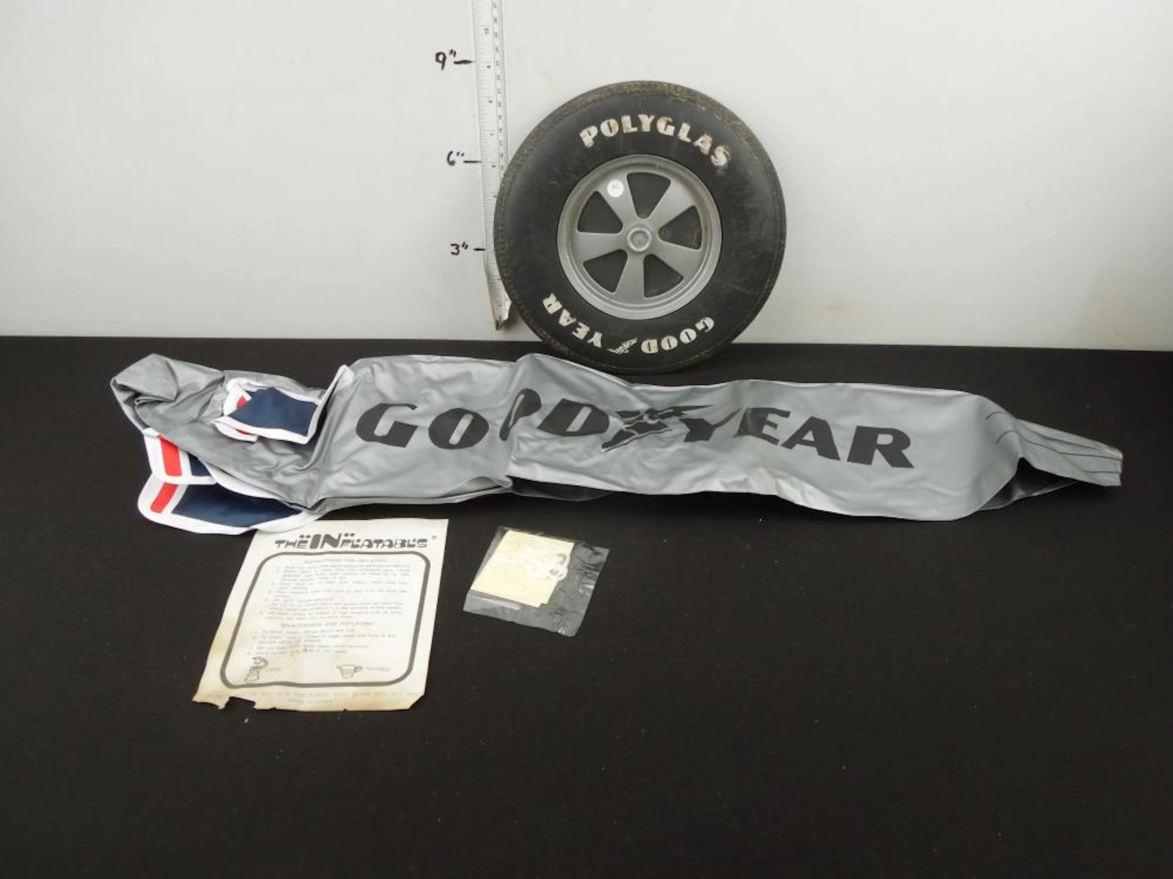 Goodyear Polyglas Tire Frisbee & Inflatable Goodyear Blimp