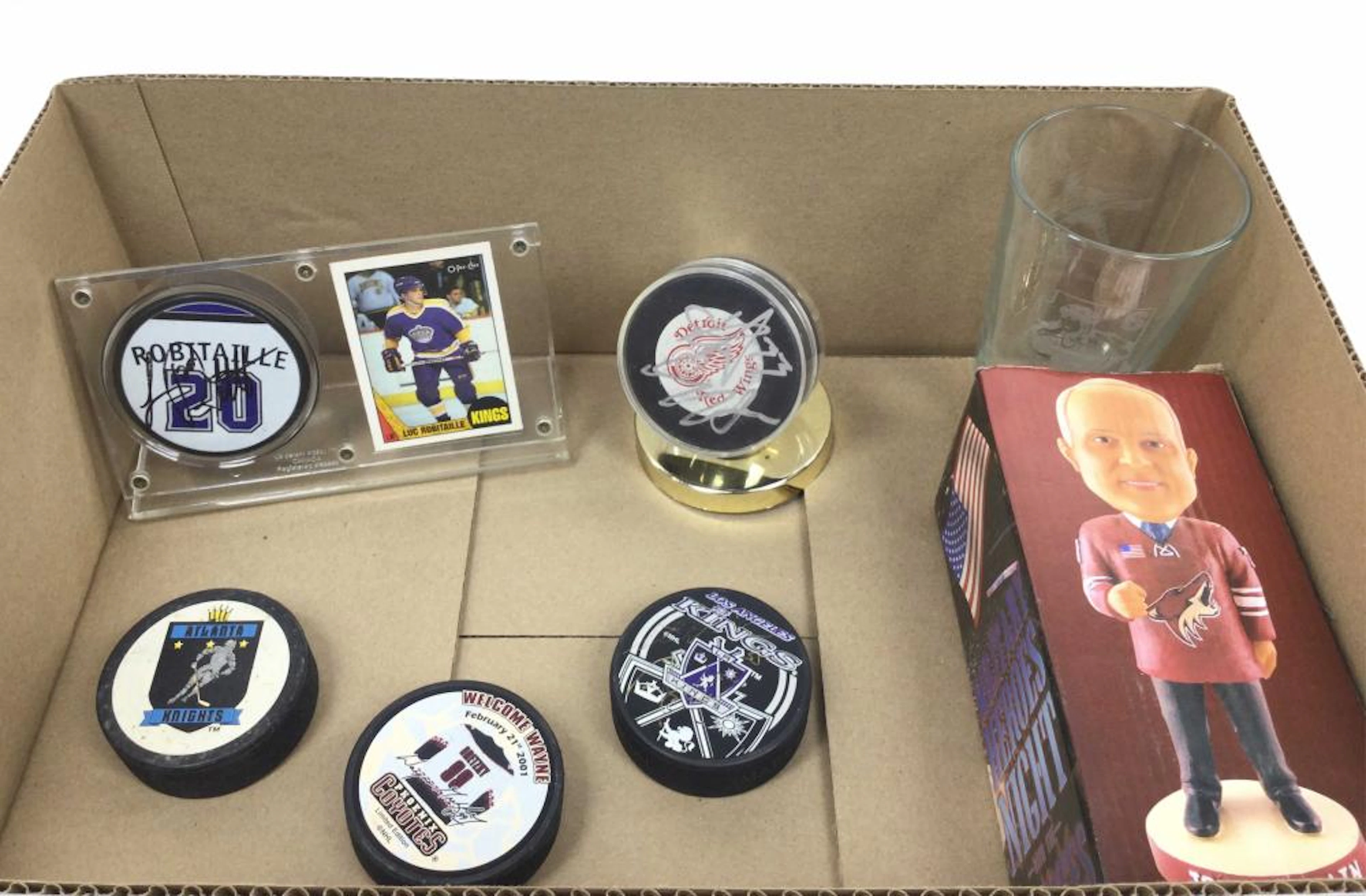 Coyotes Bobblehead, Autographed Hockey Pucks