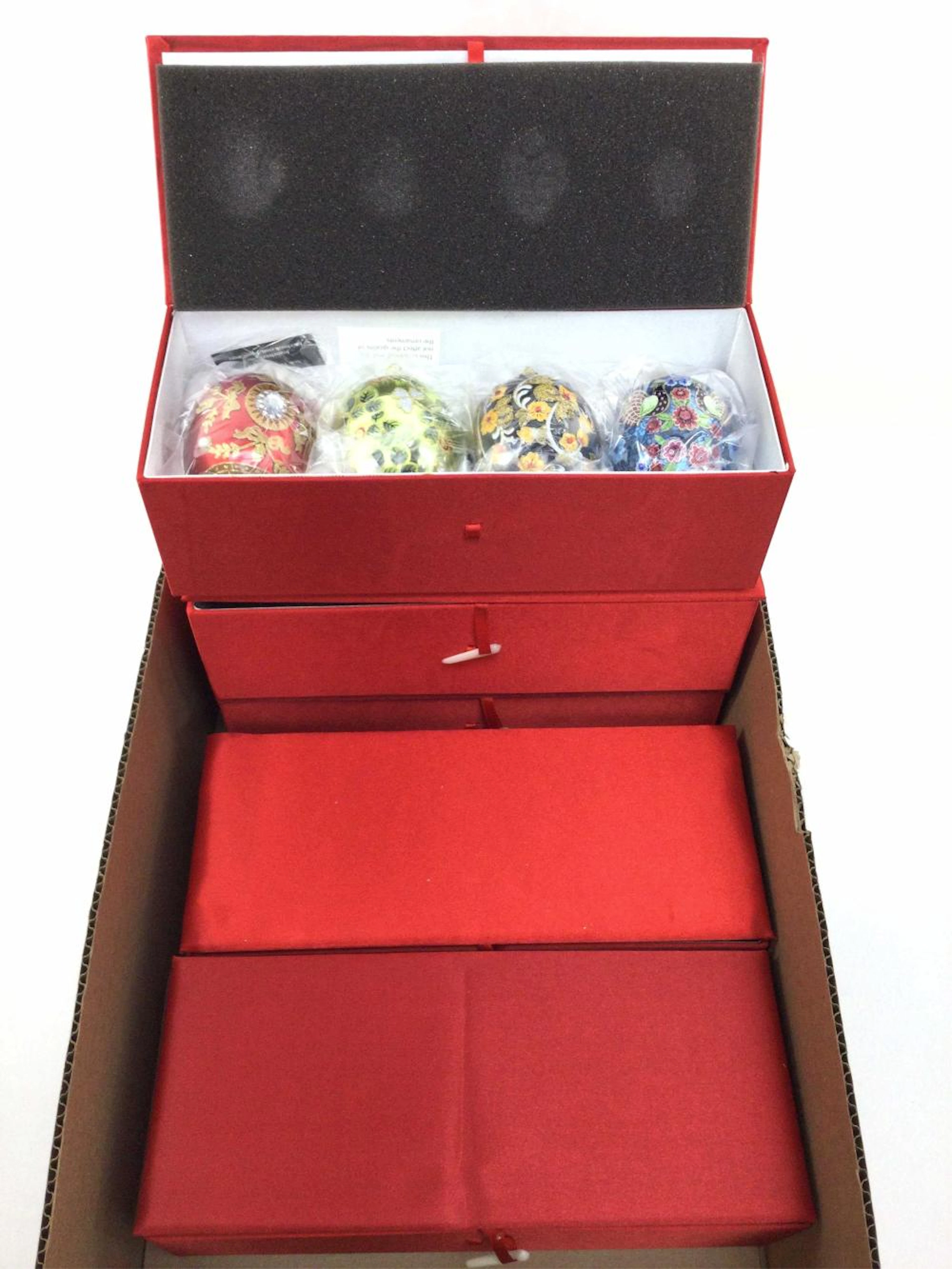 (5) Cases Of Joan Rivers Christmas Ornaments