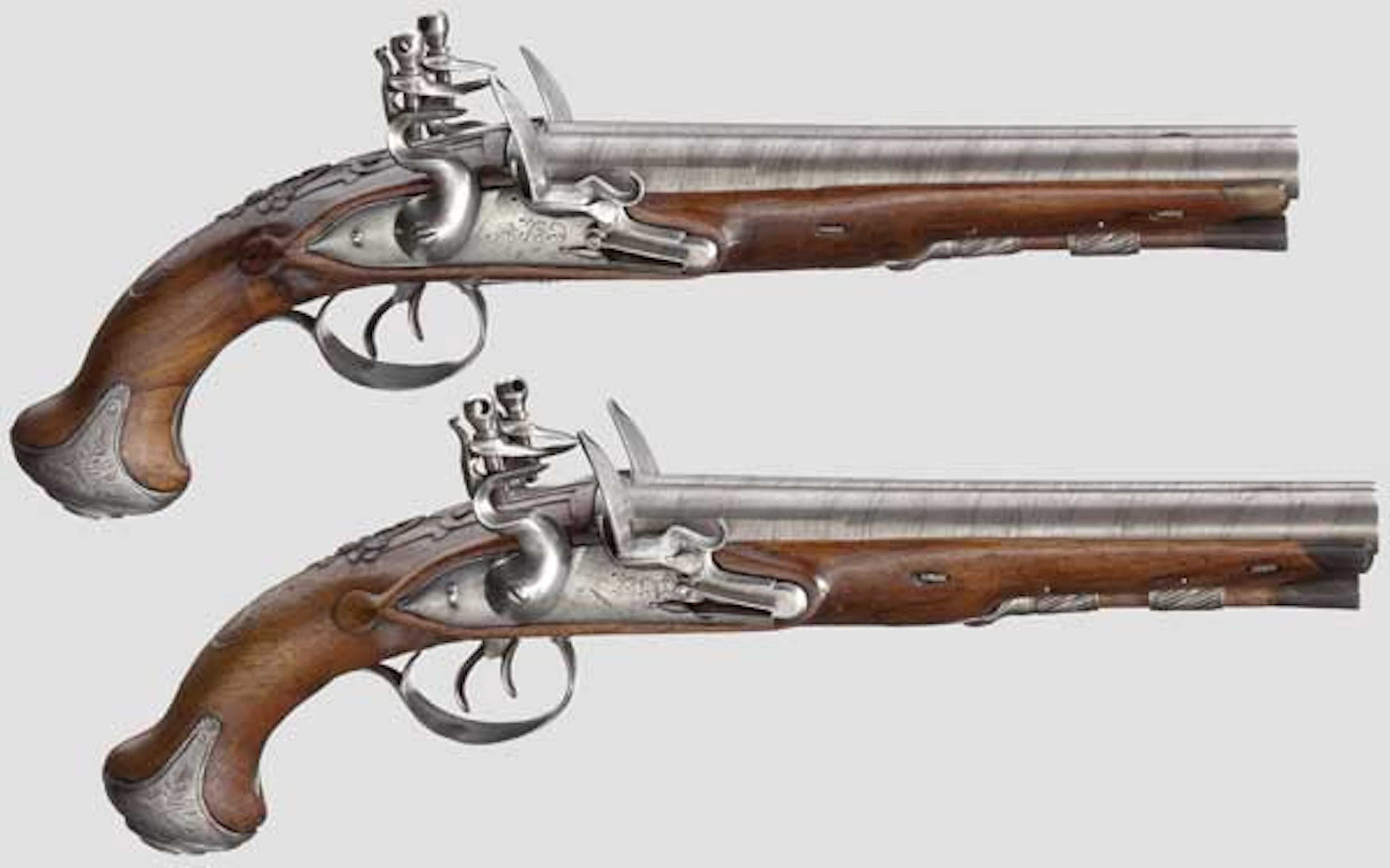 A pair of Belgian double-barrelled flintlock pistols