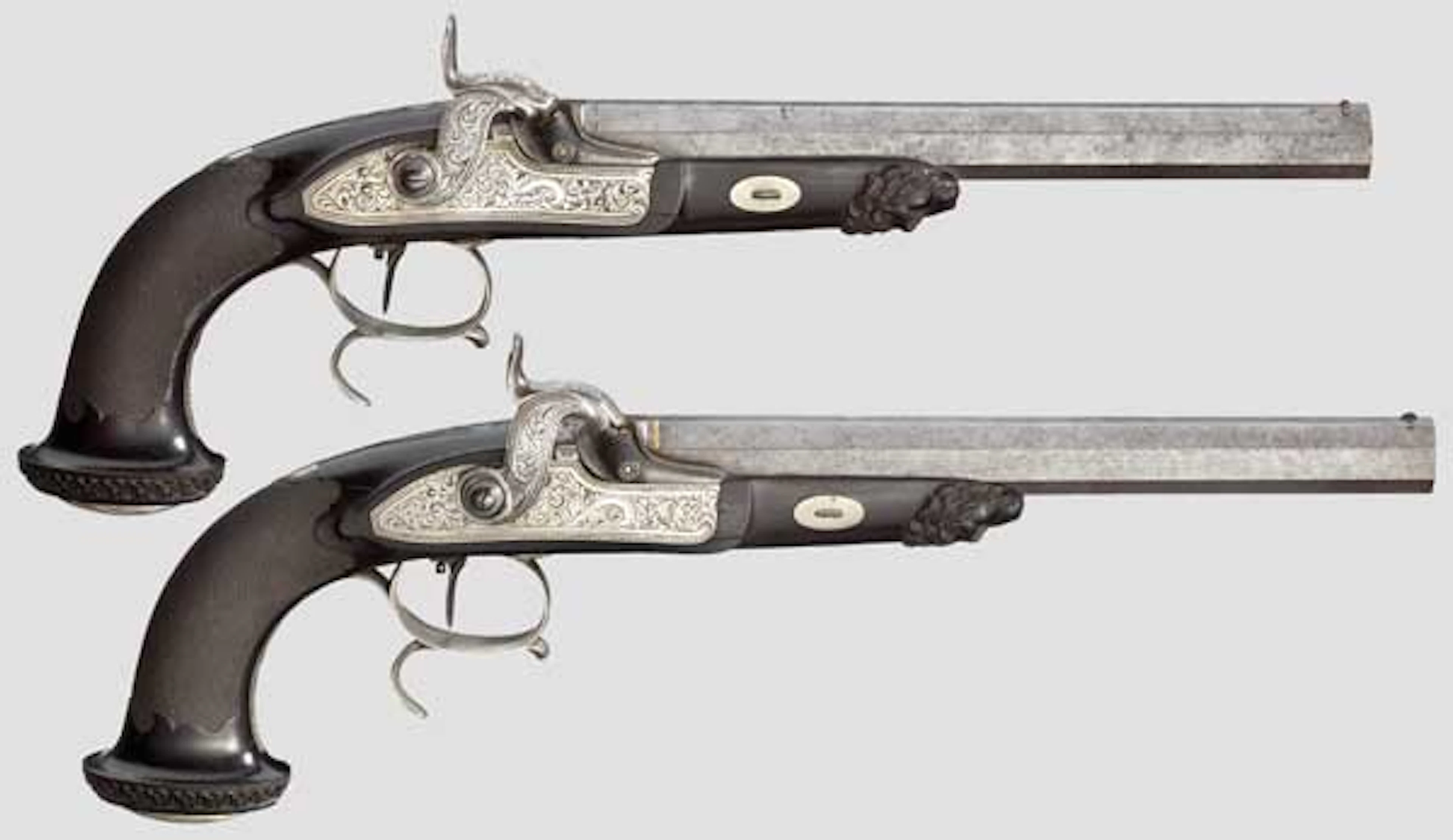 A cased pair of percussion pistols