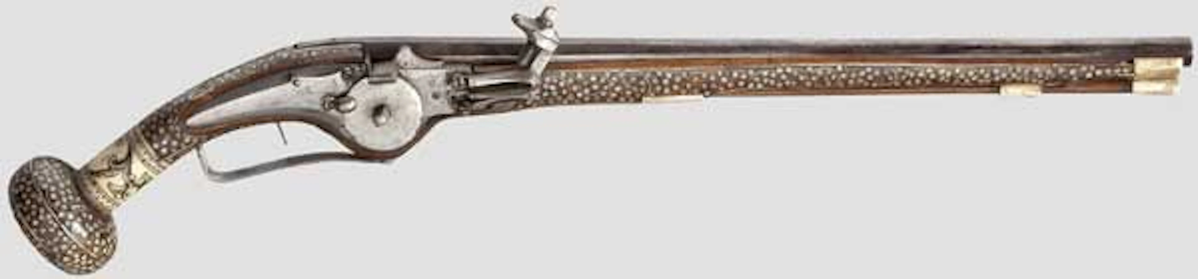 A bone-inlaid wheellock pistol.