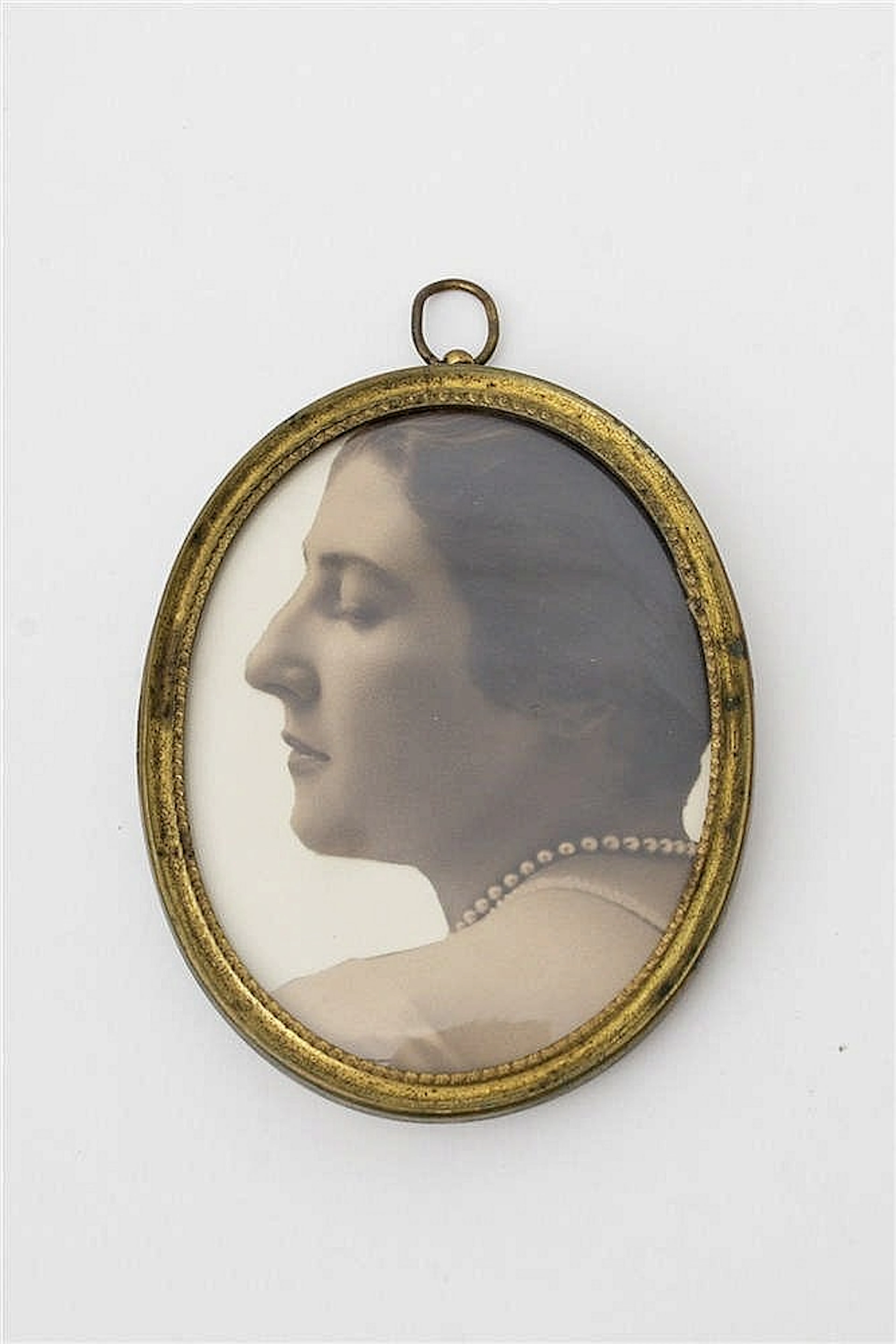 Frame with photos of Jeanne Toussaint