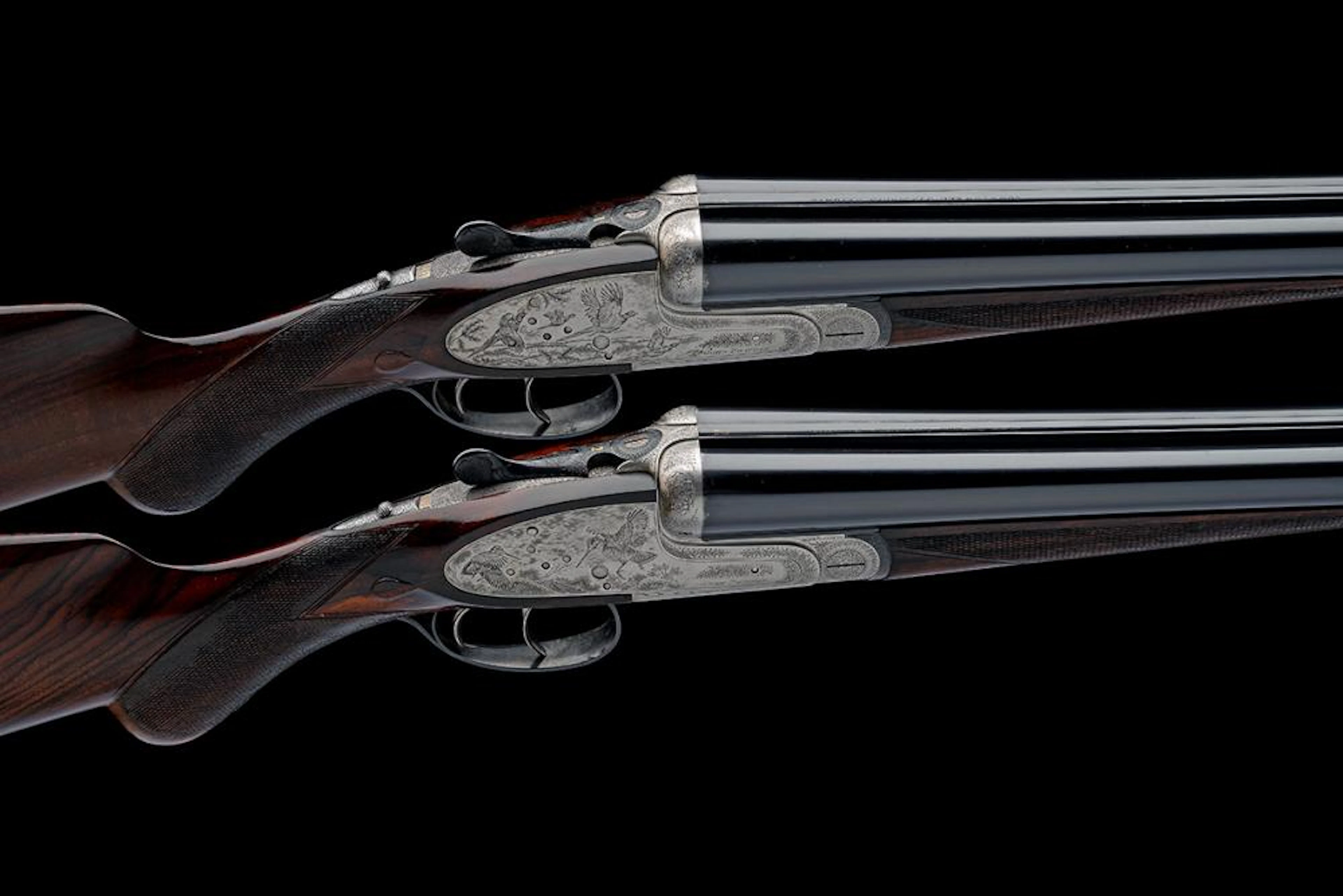 JOHN POWELL A PAIR OF BUBLIK AND CASBARD-ENGRAVED 12-BORE...