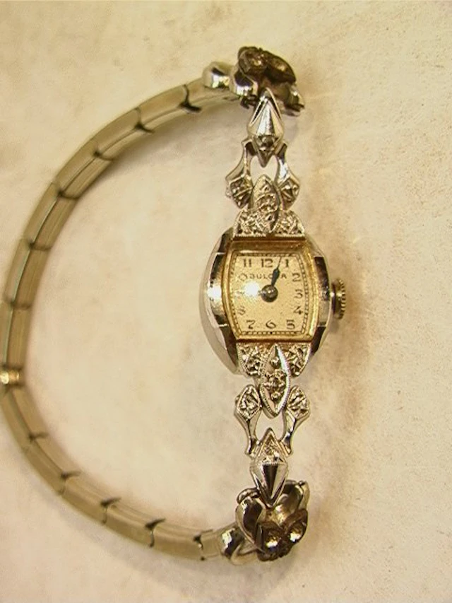 Ladies 14K Gold and Diamond Bulova Wrist Watch Wr