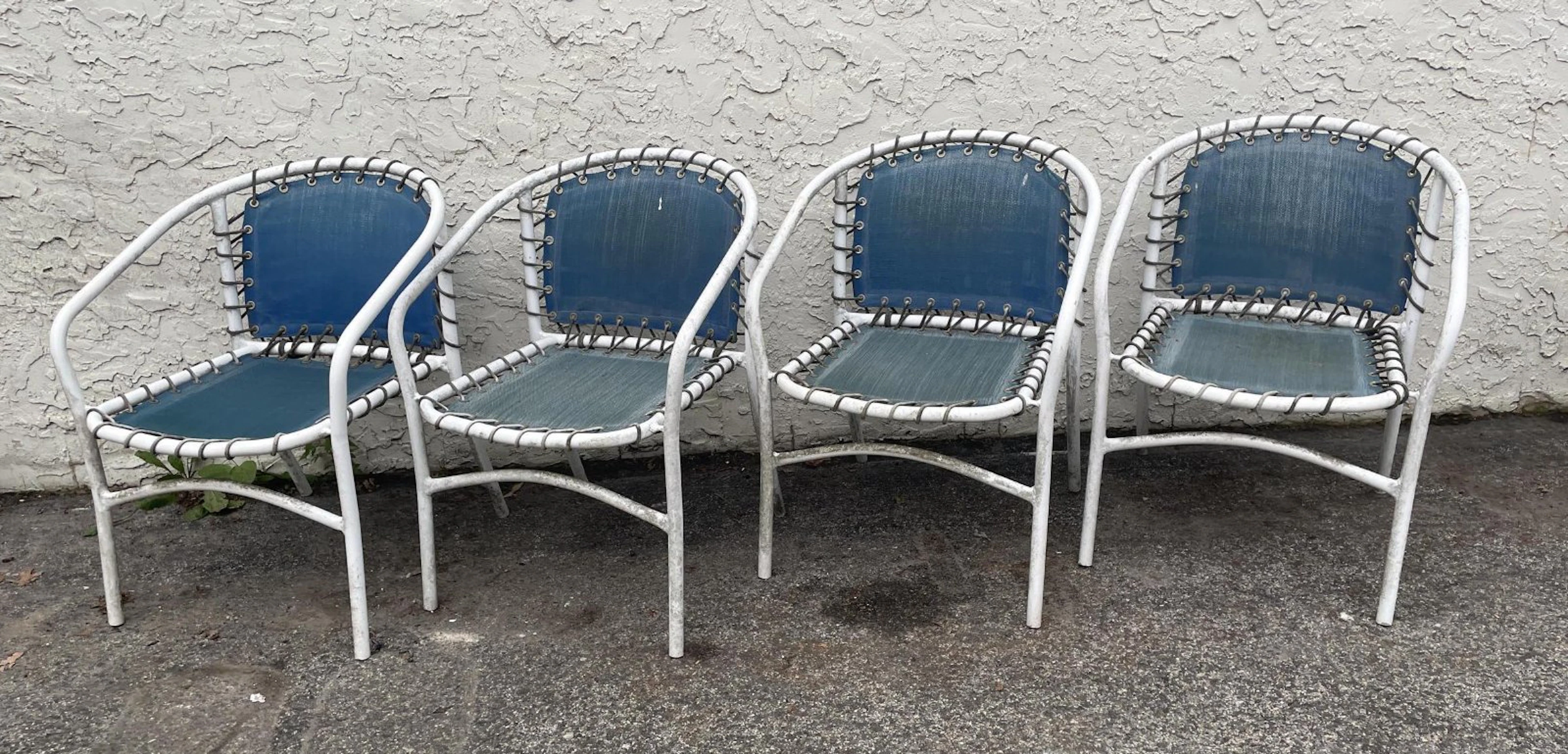 Set 4 Outdoor Chairs. Painted white metal tube frames.