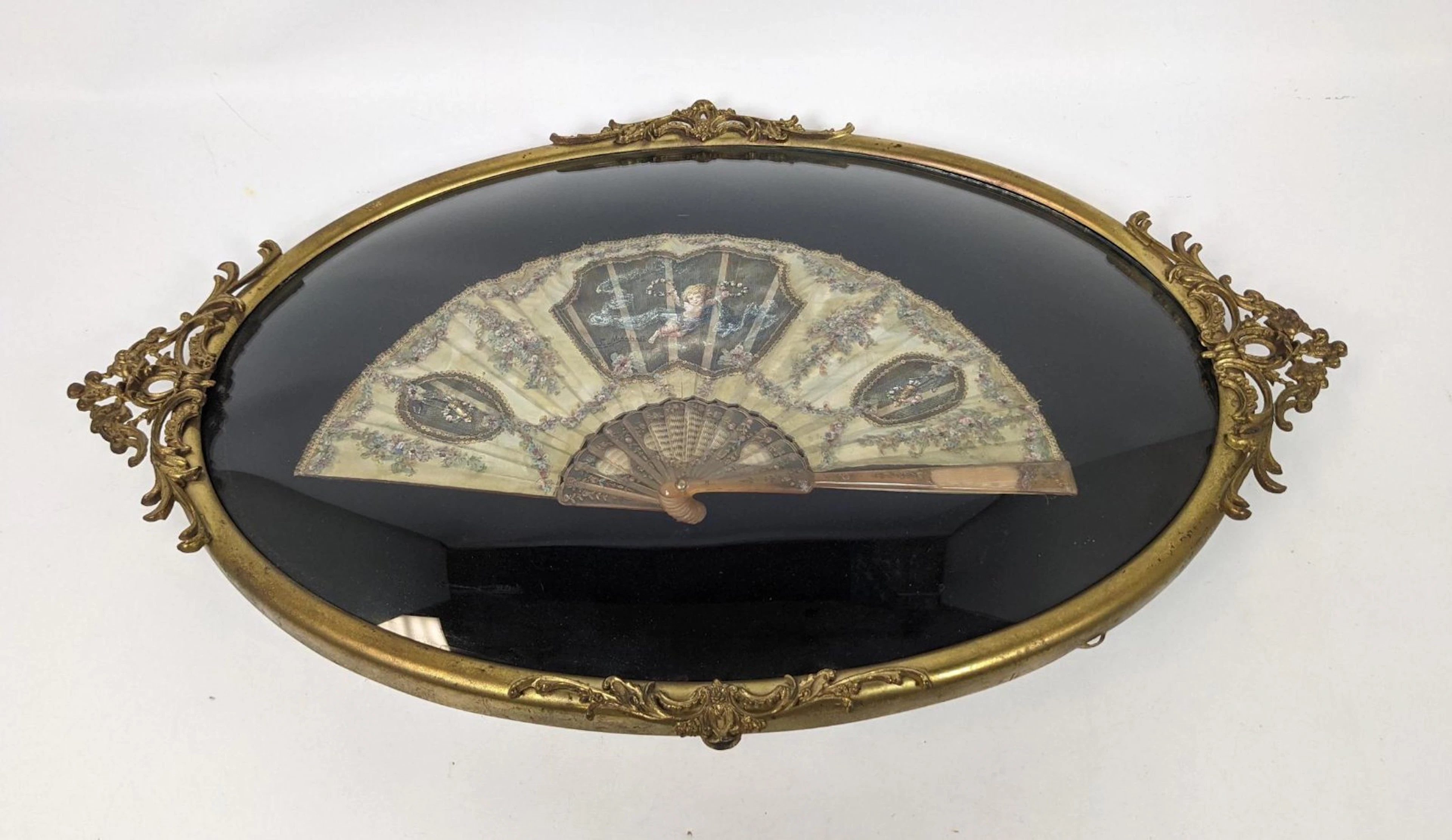 Signed Hand Painted Fan in Bow Glass Frame.