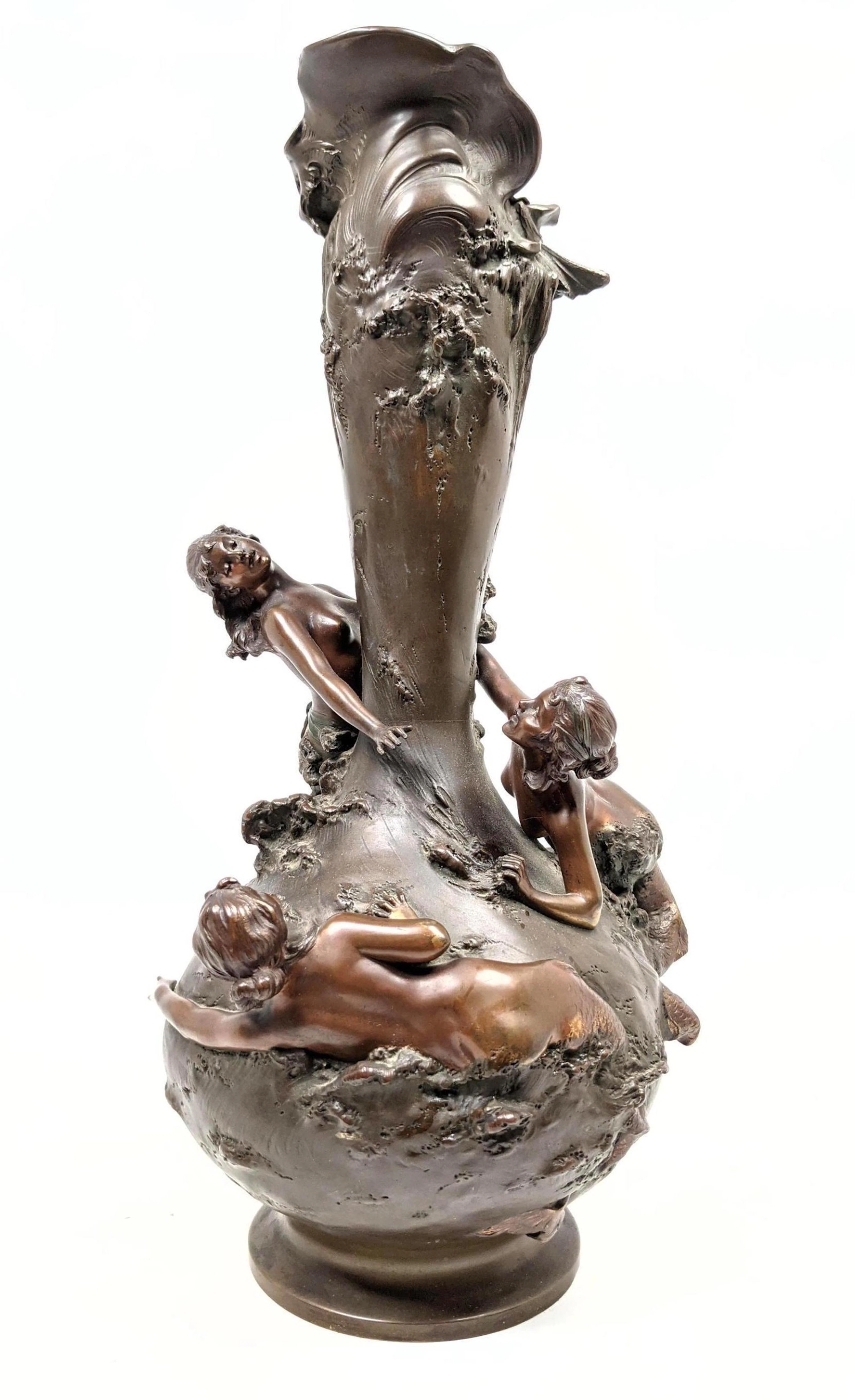French Vase with Nude Female Forms clinging to Vase.