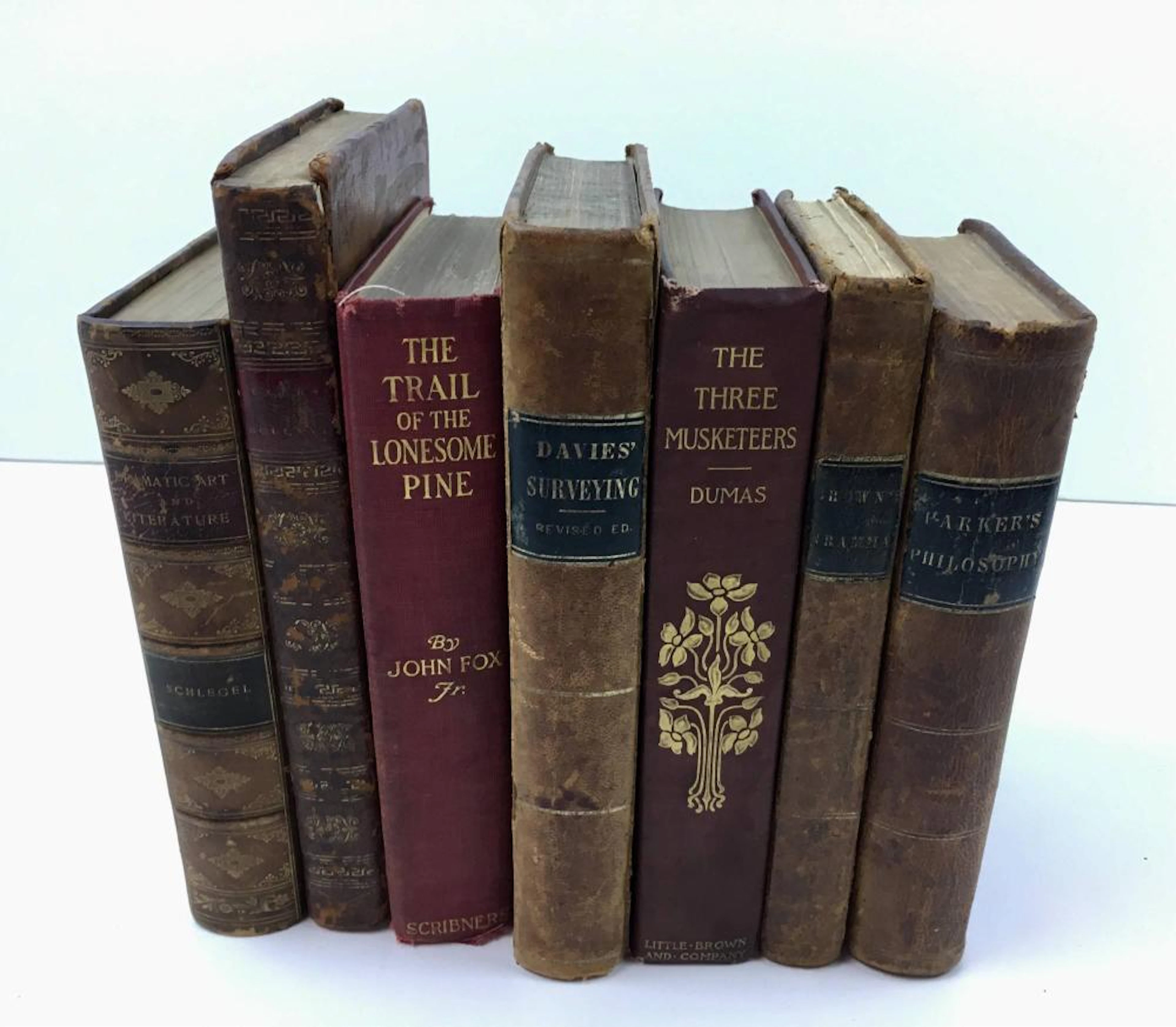 SEVEN ANTIQUE BOOKS