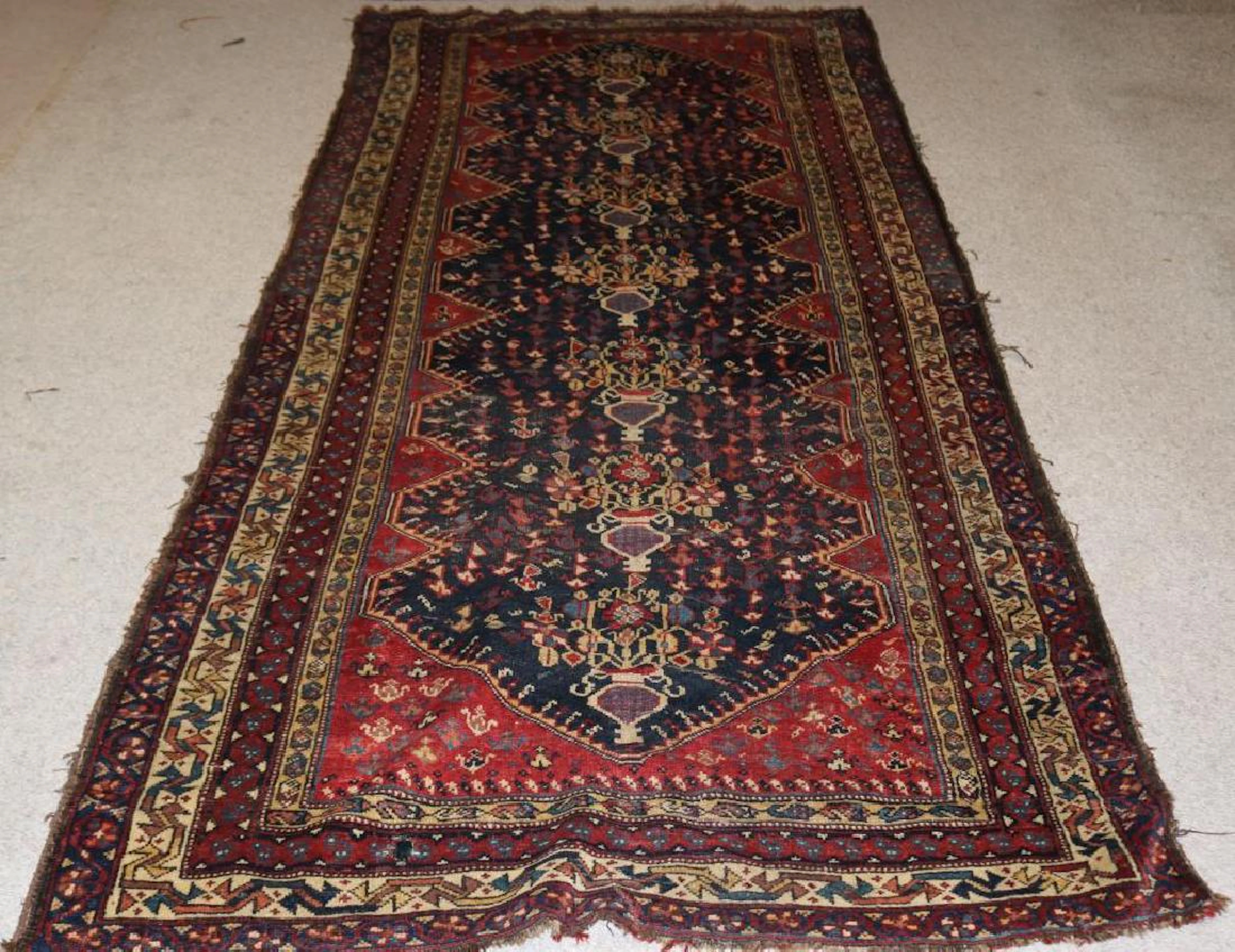 Antique shiraz rug, shows overall age