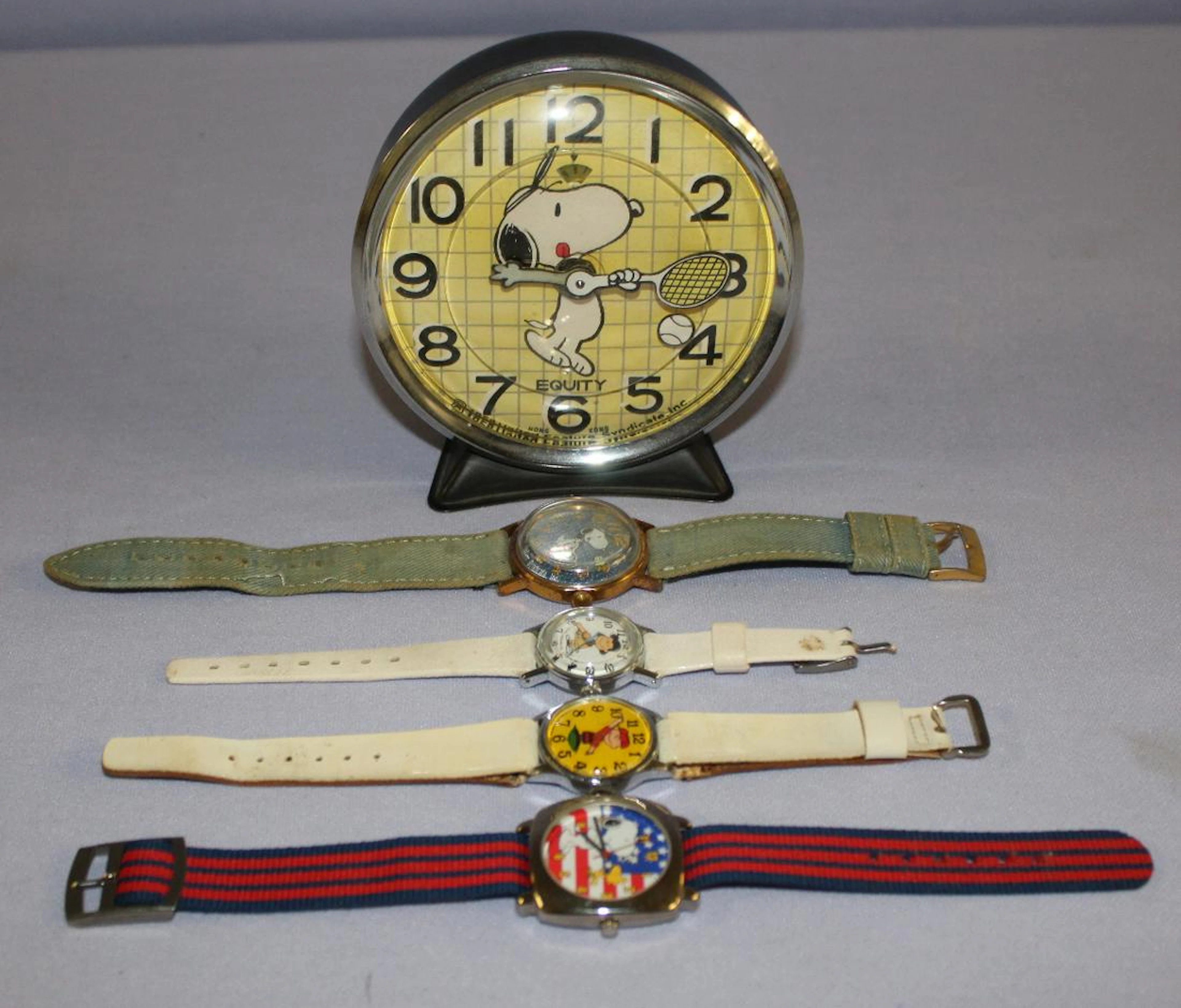 4 Peanuts Characters Wrist Watches & Alarm Clock