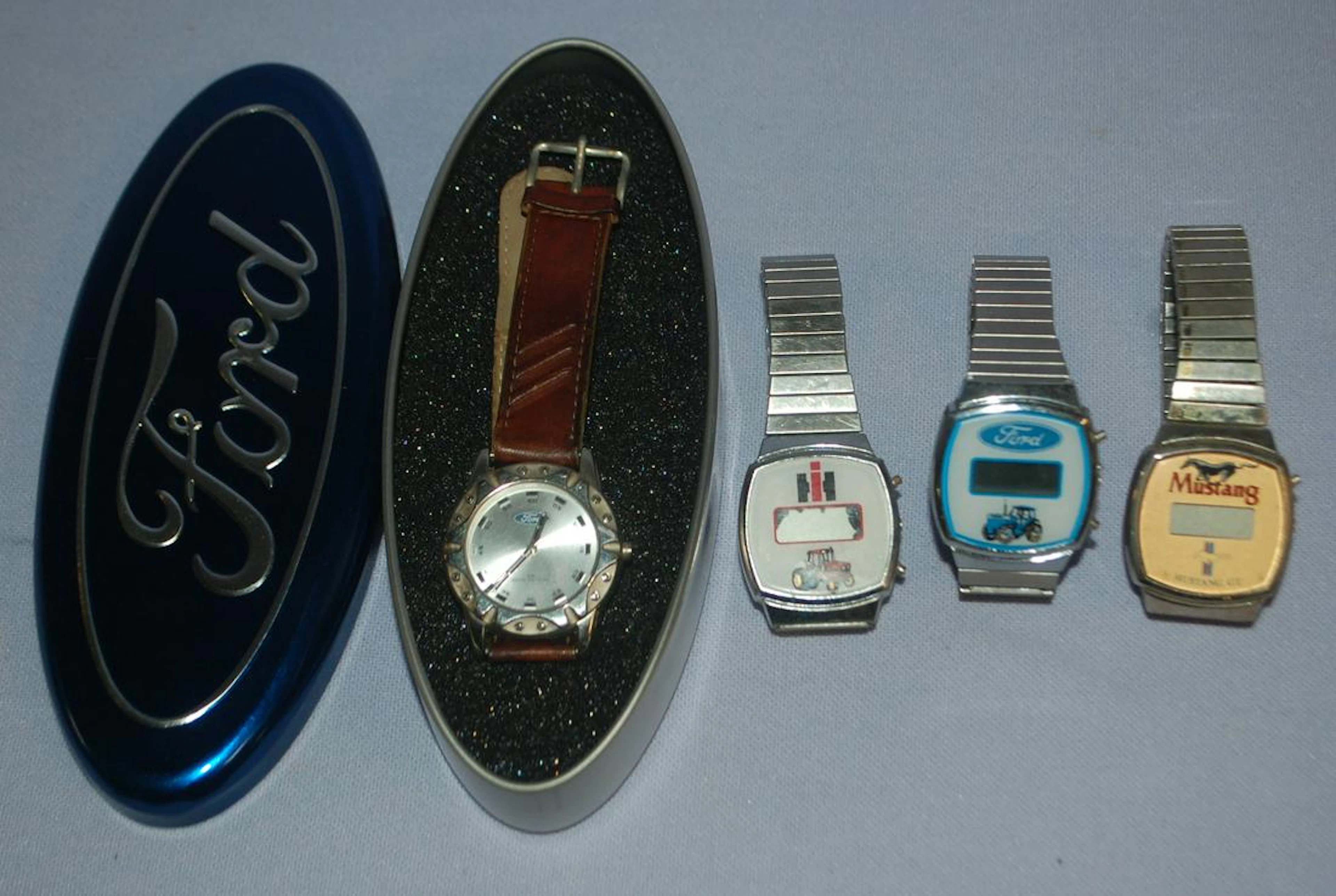 3 Ford & an IH Wrist Watches