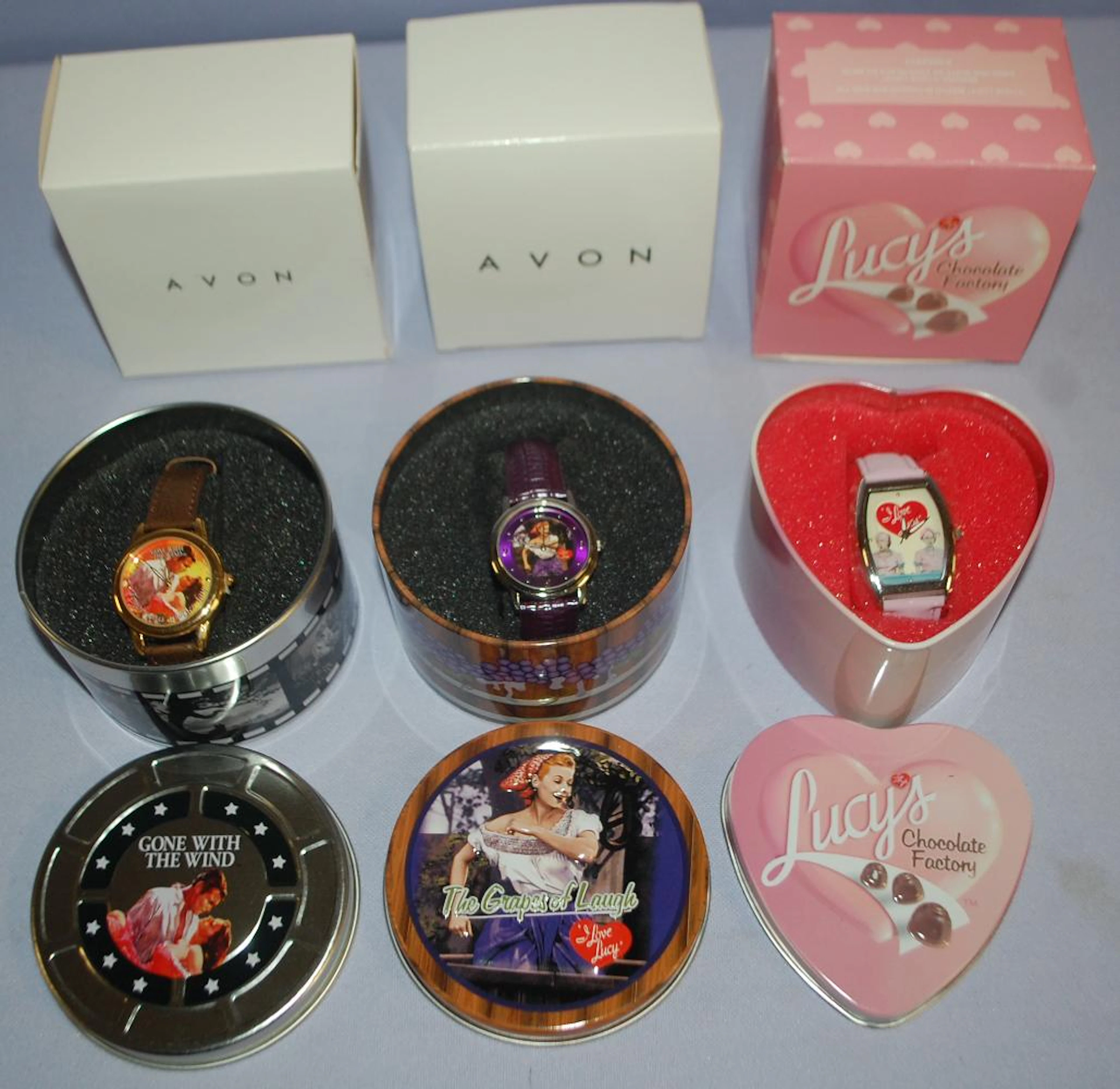 3 Avon Wrist Watches In Cans & Boxes