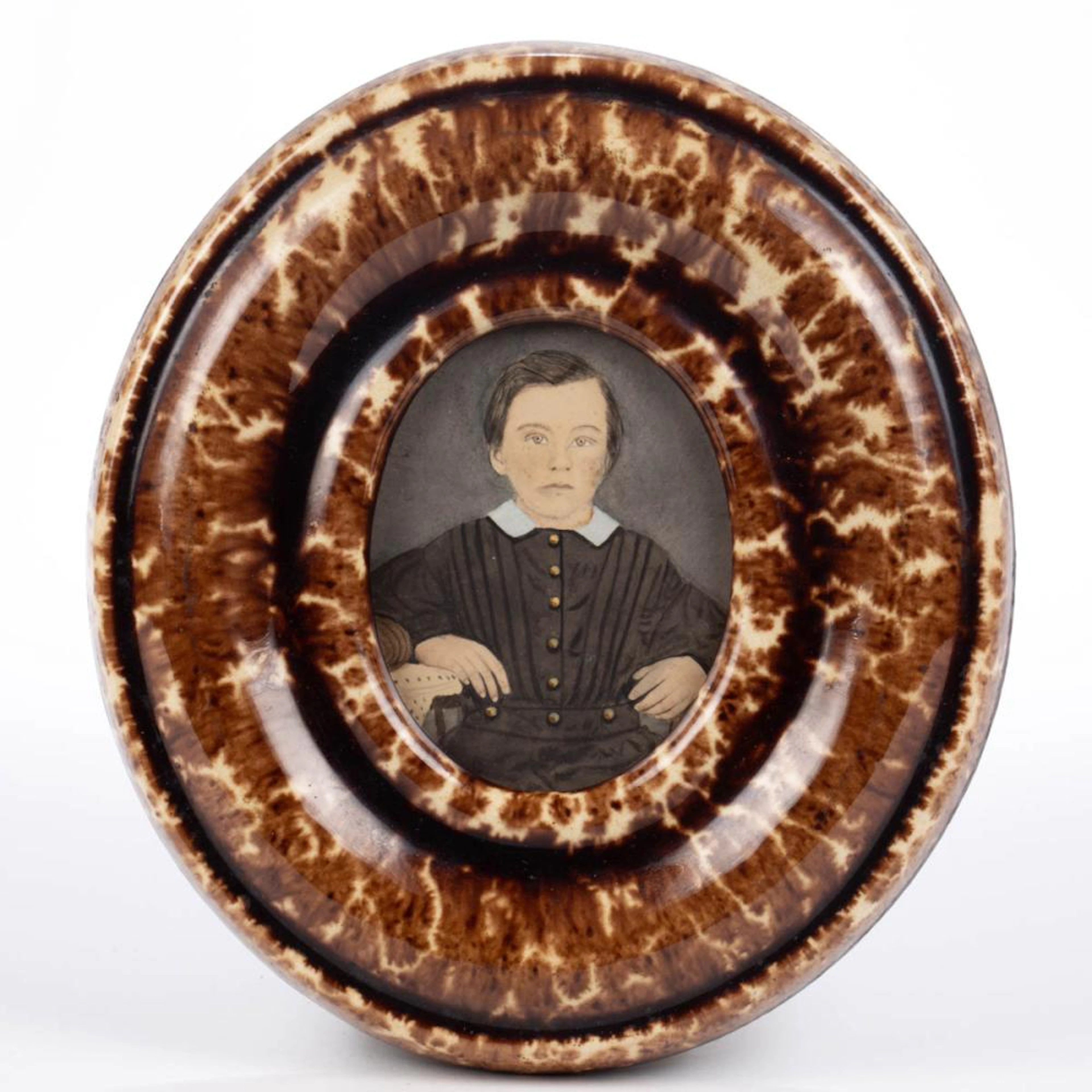 AMERICAN SCHOOL (19TH CENTURY) FOLK ART PORTRAIT OF A BOY...
